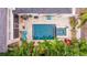 Aerial view of a home with pool and spa; lush landscaping surrounds the property at 310 8Th N Ave, St Petersburg, FL 33701