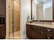 Elegant bathroom with granite vanity and a glass shower at 310 8Th N Ave, St Petersburg, FL 33701