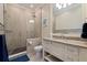 Spa-like bathroom with walk-in shower and granite vanity at 310 8Th N Ave, St Petersburg, FL 33701