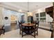 Bright dining room with view into bedroom and hardwood floors at 310 8Th N Ave, St Petersburg, FL 33701