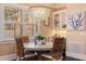 Charming dining room features round table and wicker chairs at 310 8Th N Ave, St Petersburg, FL 33701