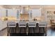 Spacious kitchen with white cabinets, large island, and stainless steel appliances at 310 8Th N Ave, St Petersburg, FL 33701