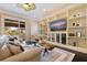 Bright living room with built-in shelving, hardwood floors, and comfortable seating at 310 8Th N Ave, St Petersburg, FL 33701
