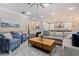 Comfortable living room with sectional sofa and large windows at 310 8Th N Ave, St Petersburg, FL 33701