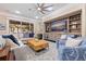 Spacious living room features a large sectional sofa and built-in shelving at 310 8Th N Ave, St Petersburg, FL 33701