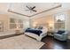 Relaxing main bedroom with a plush bed, ample natural light, and a tranquil atmosphere at 310 8Th N Ave, St Petersburg, FL 33701