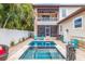Relaxing backyard oasis featuring a large pool and spa at 310 8Th N Ave, St Petersburg, FL 33701