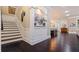 Stunning staircase with dark hardwood floors and unique wall decor at 310 8Th N Ave, St Petersburg, FL 33701