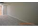 Bright bedroom with wood-look tile flooring and access to bathroom at 36750 Us Highway 19 N # 23120, Palm Harbor, FL 34684