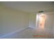 Spacious bedroom featuring light walls and wood-look tile floors at 36750 Us Highway 19 N # 23120, Palm Harbor, FL 34684