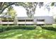 Exterior view of the building, showcasing its architecture at 36750 Us Highway 19 N # 23120, Palm Harbor, FL 34684