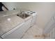 Kitchen with granite countertops and a built-in dishwasher at 36750 Us Highway 19 N # 23120, Palm Harbor, FL 34684