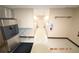 Shared laundry facility with ice maker and ironing board at 36750 Us Highway 19 N # 23120, Palm Harbor, FL 34684