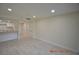 Open living area with light neutral tile flooring at 36750 Us Highway 19 N # 23120, Palm Harbor, FL 34684