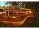 Outdoor patio with fire pit and comfortable seating at 36750 Us Highway 19 N # 23120, Palm Harbor, FL 34684