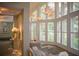 Relaxing spa waiting area with large windows and comfortable seating at 36750 Us Highway 19 N # 23120, Palm Harbor, FL 34684