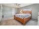 Comfortable bedroom with a large bed and ample space at 36905 Beth Ave, Zephyrhills, FL 33542