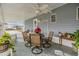Covered patio with table and chairs at 36905 Beth Ave, Zephyrhills, FL 33542