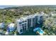 Aerial view of waterfront condo building and pool at 5020 Bayshore Blvd # 403, Tampa, FL 33611