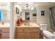 Bathroom with single sink vanity, toilet, and tub shower combo at 5020 Bayshore Blvd # 403, Tampa, FL 33611