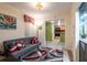 Cozy den with sleeper sofa and view into the kitchen at 5020 Bayshore Blvd # 403, Tampa, FL 33611
