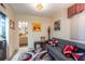 Comfortable den with sleeper sofa, artwork, and access to bathroom at 5020 Bayshore Blvd # 403, Tampa, FL 33611
