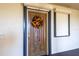 Condo entry door with a fall sunflower wreath at 5020 Bayshore Blvd # 403, Tampa, FL 33611