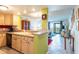 Condo kitchen with light wood cabinets and black appliances at 5020 Bayshore Blvd # 403, Tampa, FL 33611