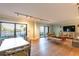 Living area with hardwood floors, patio access, and dining area at 5020 Bayshore Blvd # 403, Tampa, FL 33611