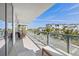 Large balcony with city views and comfortable outdoor furniture at 5120 Marina Way # 2205, Tampa, FL 33611