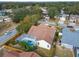 Aerial view showing a house with a screened pool at 630 Bayside Dr, Tarpon Springs, FL 34689