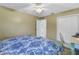 Bedroom with double bed, built-in dresser, and access to bathroom at 6390 115Th Ln, Seminole, FL 33772