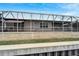 Back exterior view, showcasing a screened patio at 705 Pinckney Dr, Apollo Beach, FL 33572