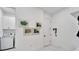 Laundry room with washer, dryer, and cabinets at 705 Pinckney Dr, Apollo Beach, FL 33572
