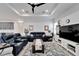 Open living room with ample seating and large TV at 705 Pinckney Dr, Apollo Beach, FL 33572