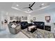 Spacious living room with comfortable seating and a large TV at 705 Pinckney Dr, Apollo Beach, FL 33572