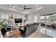 Bright living room with water views, comfortable seating, and a large TV at 705 Pinckney Dr, Apollo Beach, FL 33572