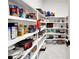 Well-organized pantry with ample shelving for storage at 705 Pinckney Dr, Apollo Beach, FL 33572