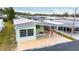 Bird's-eye view of a light green manufactured home at 7050 El Matador St, Zephyrhills, FL 33541