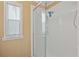 Updated bathroom with a walk-in shower and glass enclosure at 7050 El Matador St, Zephyrhills, FL 33541