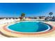 Inviting kidney-shaped pool with surrounding patio at 7050 El Matador St, Zephyrhills, FL 33541