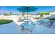 Poolside patio furniture and umbrellas at 7050 El Matador St, Zephyrhills, FL 33541