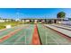 Community shuffleboard courts under covered area at 7050 El Matador St, Zephyrhills, FL 33541