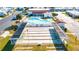 Community shuffleboard courts with covered seating areas at 7050 El Matador St, Zephyrhills, FL 33541