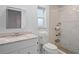 Updated bathroom with walk-in shower and vanity at 8130 Merrimac Dr, Port Richey, FL 34668