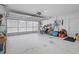 Garage with automatic door opener and ample space at 8130 Merrimac Dr, Port Richey, FL 34668