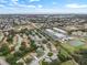 Wide aerial view showing the neighborhood and the house's location at 8130 Merrimac Dr, Port Richey, FL 34668