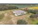 This home boasts a large lot with beautiful landscaping at 8459 Harvey Walden Dr, Plant City, FL 33565