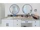 Bathroom with double vanity and granite countertop at 8459 Harvey Walden Dr, Plant City, FL 33565