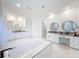 Large bathroom with double vanities and a free-standing tub at 8459 Harvey Walden Dr, Plant City, FL 33565